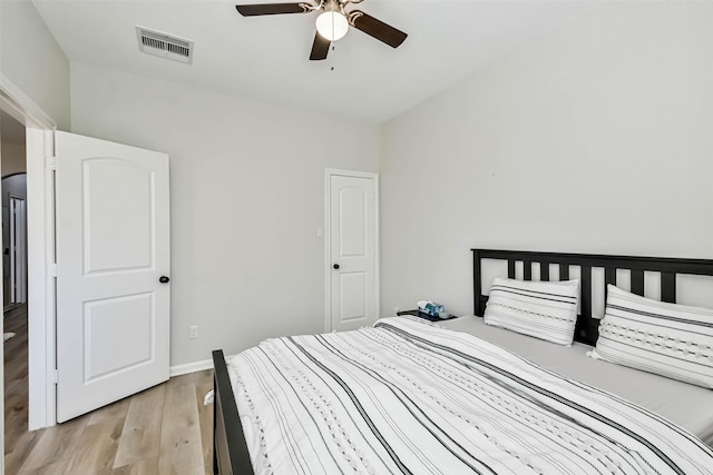 bedroom featuring ceiling fan and light hardwood / wood-style flooring