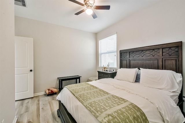 bedroom featuring ceiling fan and light hardwood / wood-style flooring