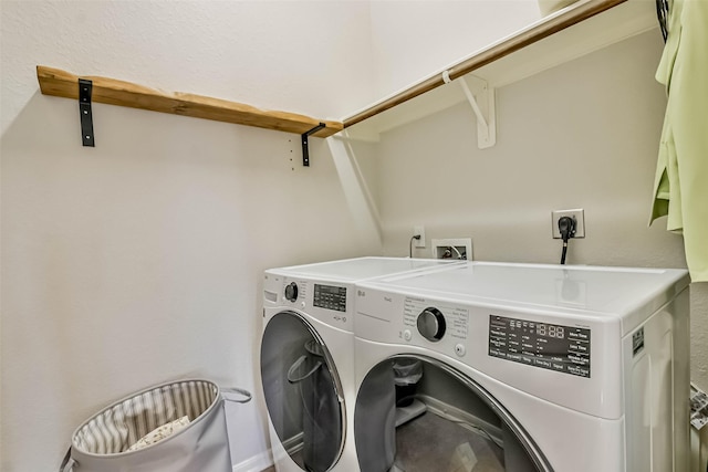 laundry area featuring washer and clothes dryer