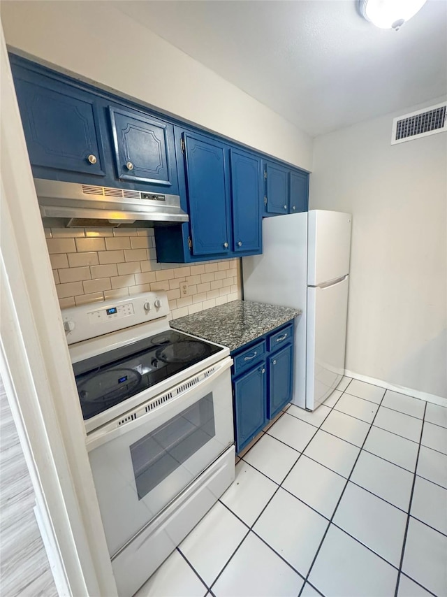 kitchen featuring tasteful backsplash, white appliances, blue cabinets, and light tile patterned flooring