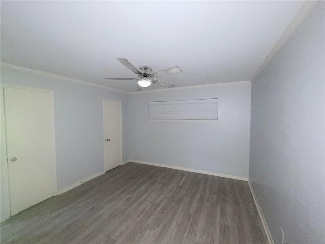 unfurnished room with ceiling fan, ornamental molding, and dark hardwood / wood-style flooring