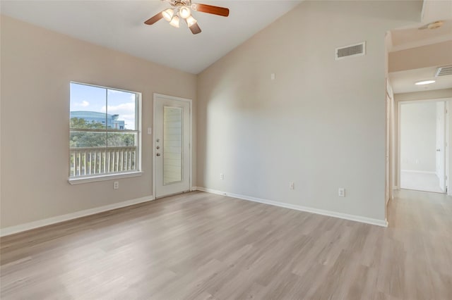 unfurnished room with high vaulted ceiling, ceiling fan, and light hardwood / wood-style flooring