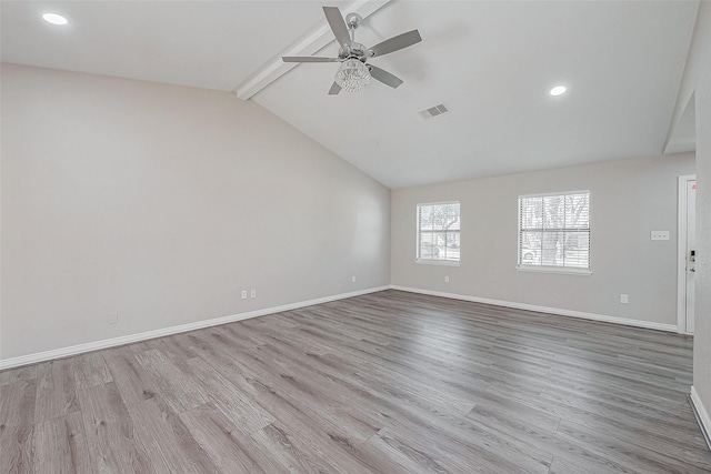 unfurnished room with vaulted ceiling with beams, light hardwood / wood-style flooring, and ceiling fan