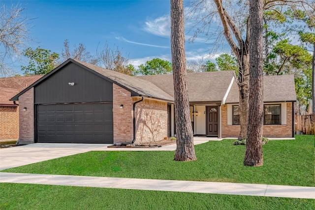 ranch-style house with a garage and a front lawn