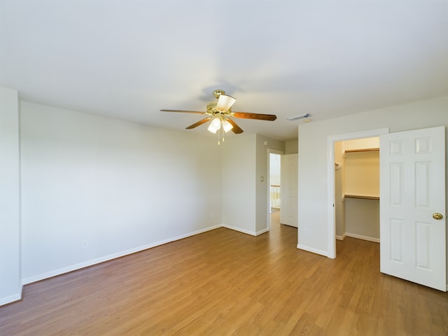 interior space with ceiling fan and light hardwood / wood-style floors