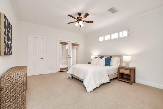 carpeted bedroom featuring crown molding, access to outside, french doors, and ceiling fan