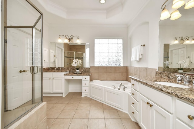 bathroom featuring crown molding, shower with separate bathtub, vanity, a tray ceiling, and tile patterned flooring