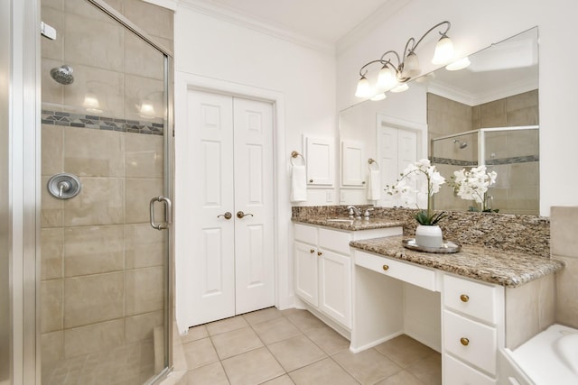 bathroom featuring vanity, an enclosed shower, and ornamental molding