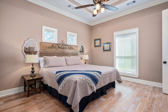 bedroom with crown molding, ceiling fan, and light wood-type flooring