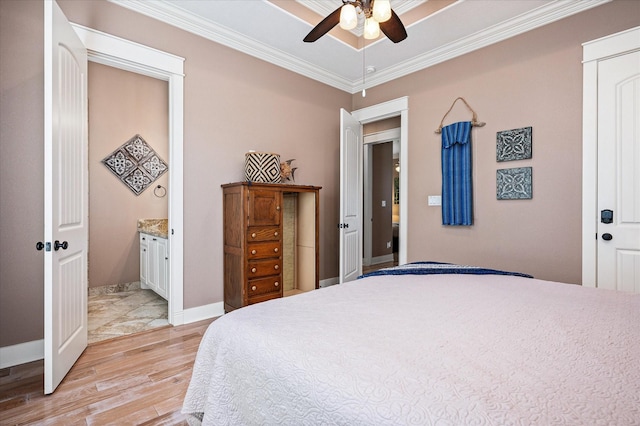 bedroom with ornamental molding, ceiling fan, and light hardwood / wood-style flooring