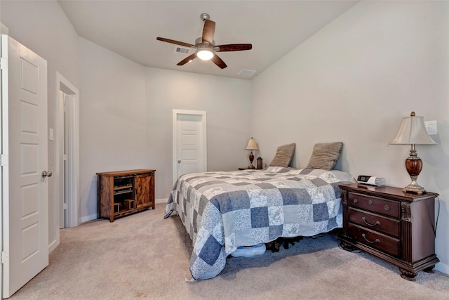 bedroom with ceiling fan and light colored carpet