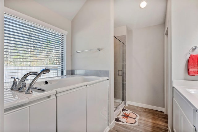 washroom with hardwood / wood-style flooring and sink