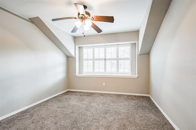 empty room with carpet floors and ceiling fan