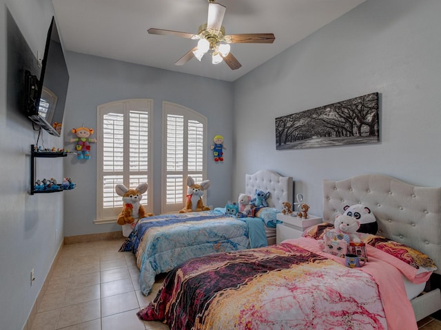 bedroom with light tile patterned flooring and ceiling fan