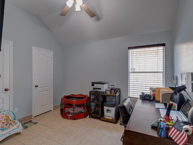 tiled office with lofted ceiling and ceiling fan