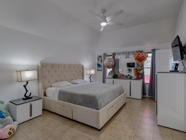 tiled bedroom with vaulted ceiling and ceiling fan