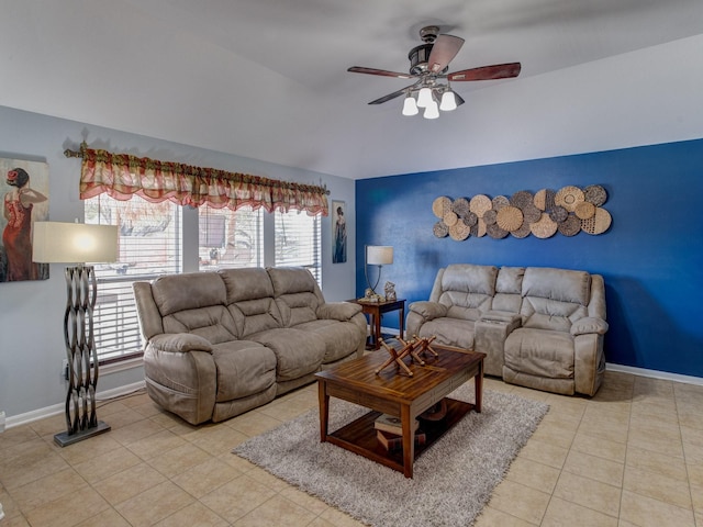 tiled living room with ceiling fan