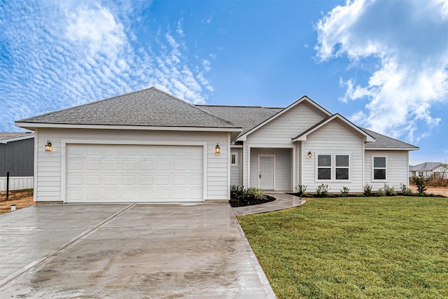 single story home with a garage and a front lawn