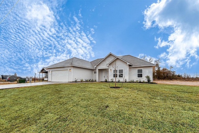 ranch-style house featuring a garage and a front yard