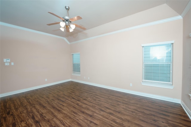 empty room with crown molding, ceiling fan, lofted ceiling, and dark hardwood / wood-style flooring