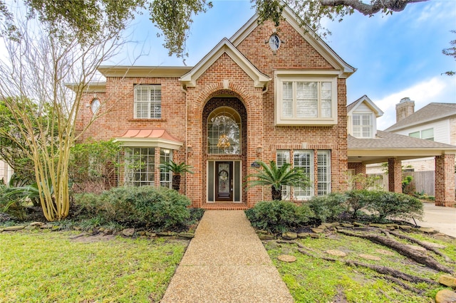 view of front of property with a front lawn