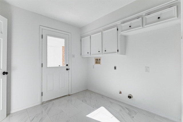 laundry area with electric dryer hookup, washer hookup, cabinets, and gas dryer hookup