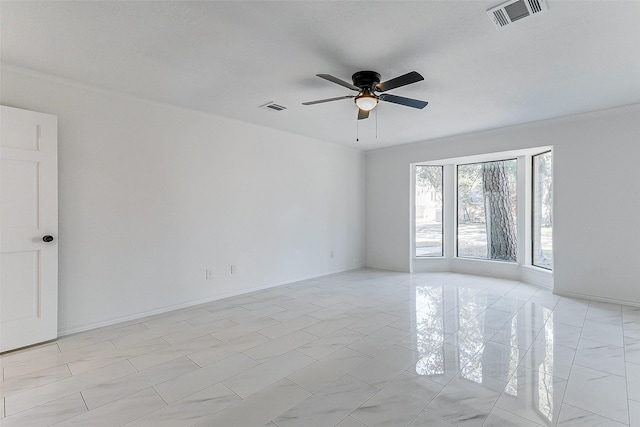 unfurnished room with ceiling fan