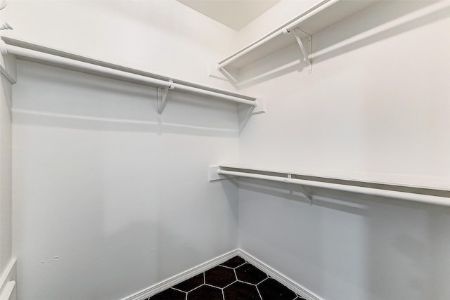 walk in closet featuring tile patterned floors