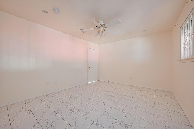 empty room featuring ceiling fan