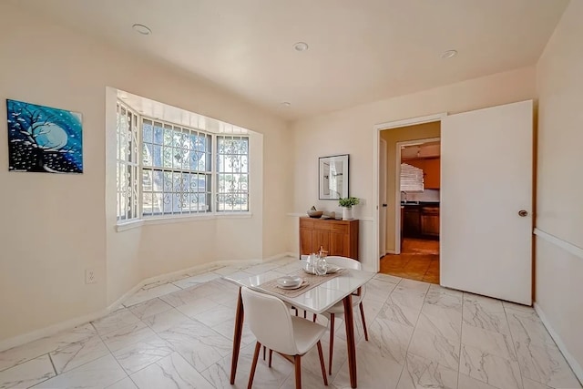 dining room featuring sink