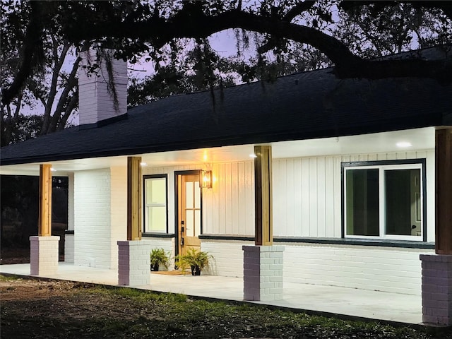 view of property exterior at dusk