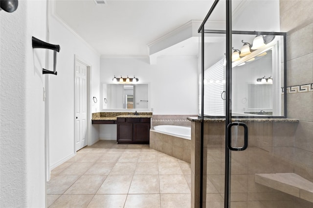 bathroom featuring crown molding, vanity, tile patterned floors, and plus walk in shower