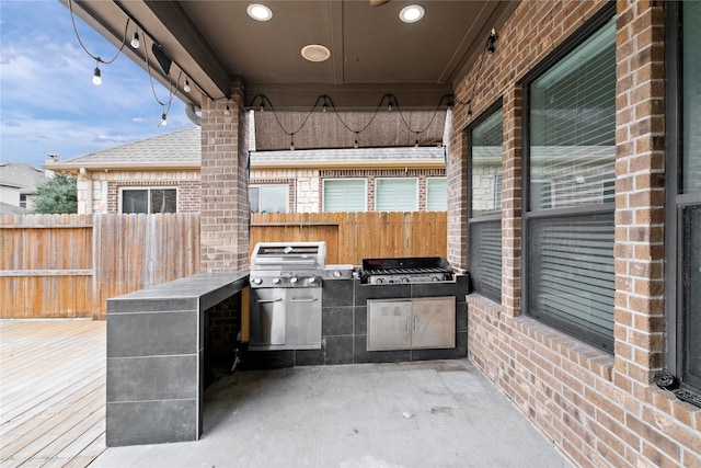 view of patio with exterior kitchen and area for grilling