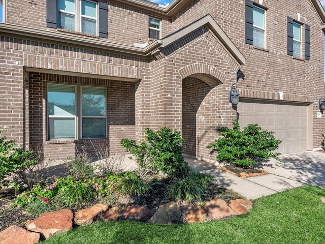 entrance to property featuring a garage