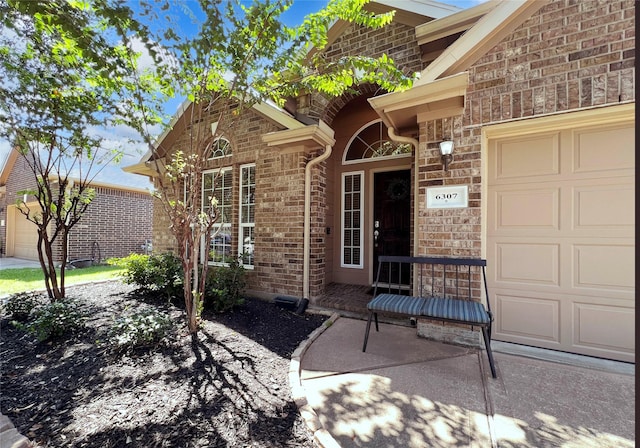 property entrance featuring a garage