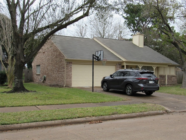 view of side of home with a garage and a lawn