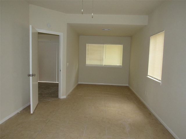 view of tiled spare room