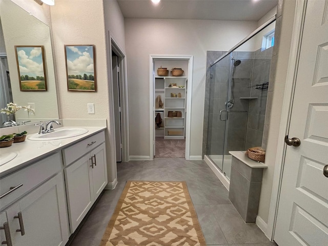 bathroom featuring vanity and walk in shower