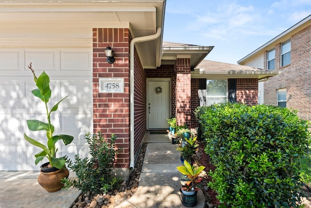 entrance to property featuring a garage