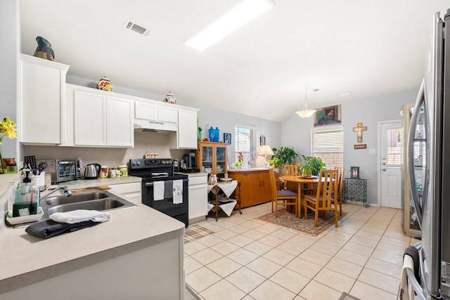 kitchen featuring white cabinetry, black electric range oven, sink, and a healthy amount of sunlight