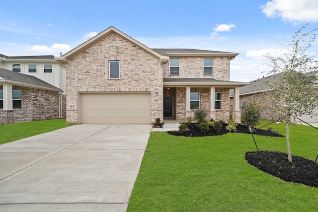 view of front of home with a garage and a front yard