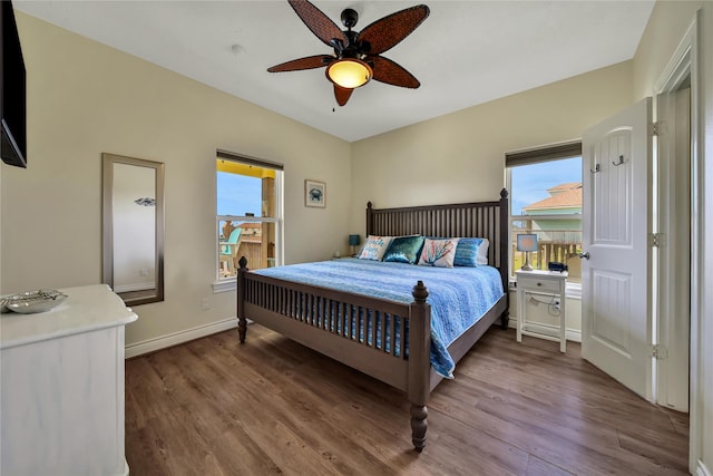 bedroom featuring hardwood / wood-style flooring and ceiling fan