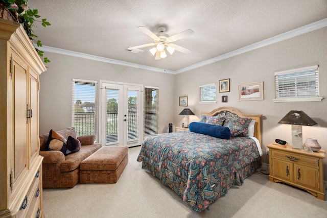 carpeted bedroom with crown molding, ceiling fan, a textured ceiling, access to outside, and french doors