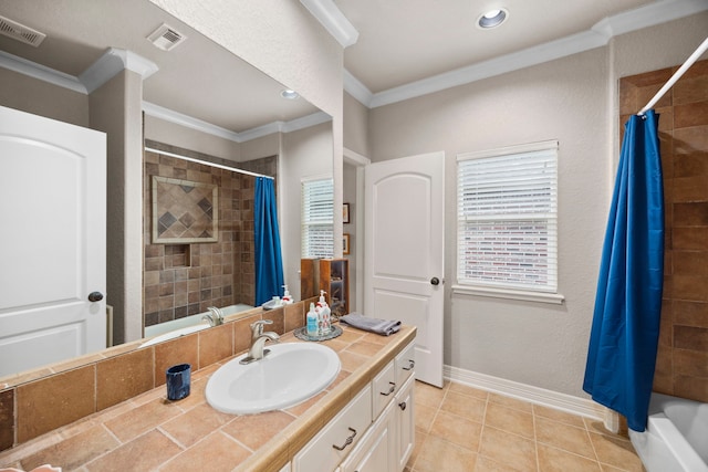 bathroom featuring vanity, tile patterned floors, ornamental molding, and shower / bath combination with curtain