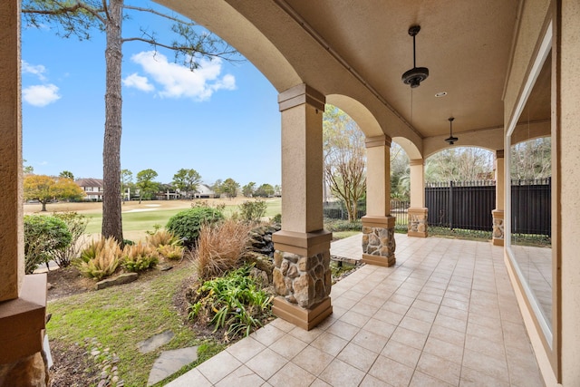 view of patio / terrace featuring ceiling fan