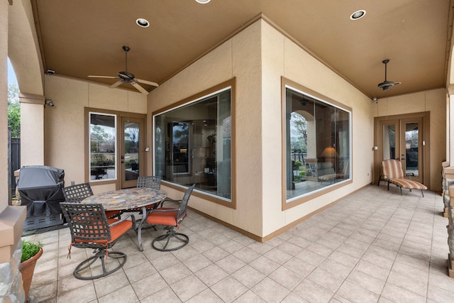 view of patio / terrace featuring grilling area, french doors, and ceiling fan