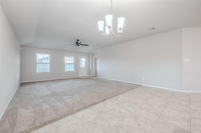 carpeted empty room with ceiling fan with notable chandelier