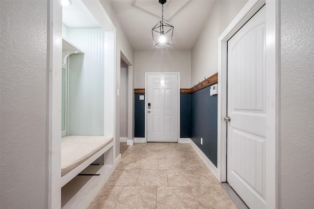 mudroom featuring light tile patterned floors