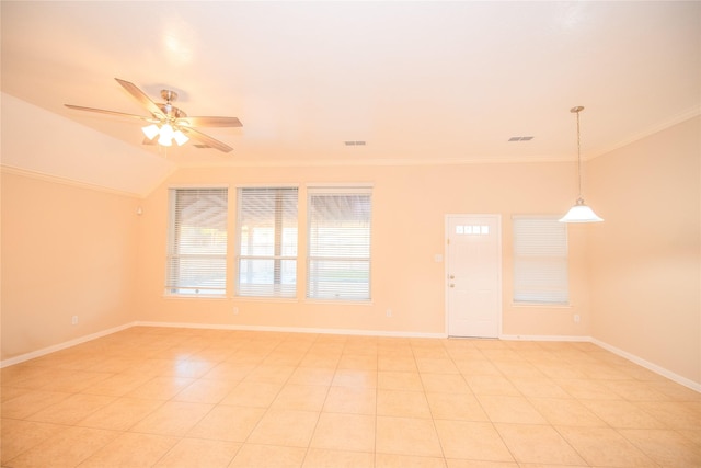 unfurnished room with baseboards, ceiling fan, visible vents, and crown molding