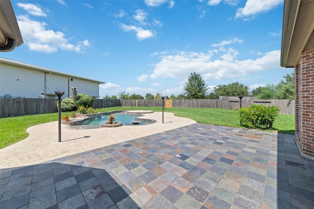 view of swimming pool featuring a yard and a patio